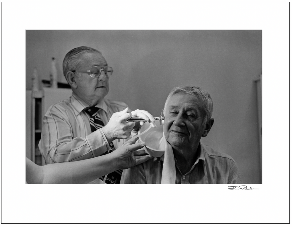 Doc Cleaning out the Ear Wax, Cuba, Kansas